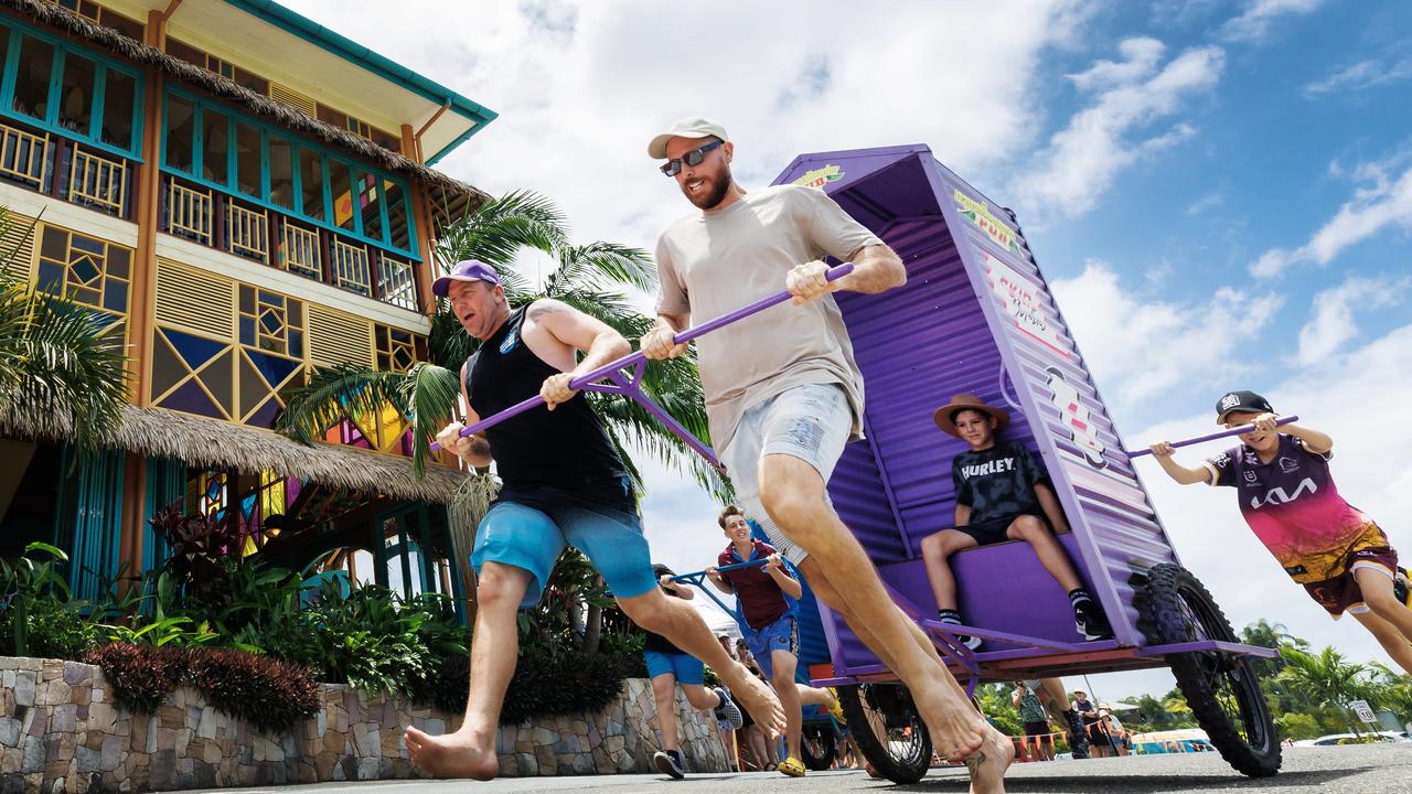 Teams compete in the annual Australia Day Outback Dunny race at Glenview on the Sunshine Coast. Picture Lachie Millard