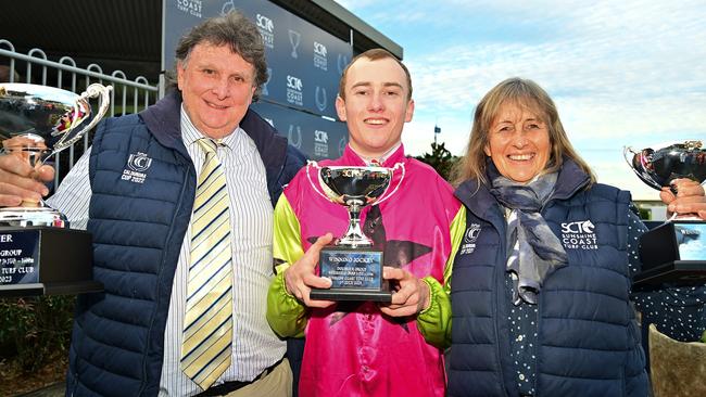 Trainers Sheila Laxon and John Symons and apprentice jockey Jaden Lloyd. Picture: Grant Peters-Trackside Photography