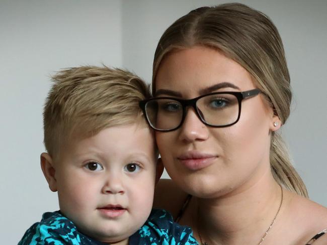 Harry Weeks 2 with his mother Taylah Weeks . Harry  had to have his toe reattached after it was slammed in the door at a kindergarten at Jimboomba. The daycare called and said his toe had been jammed and was bleeding. Pic Jamie Hanson