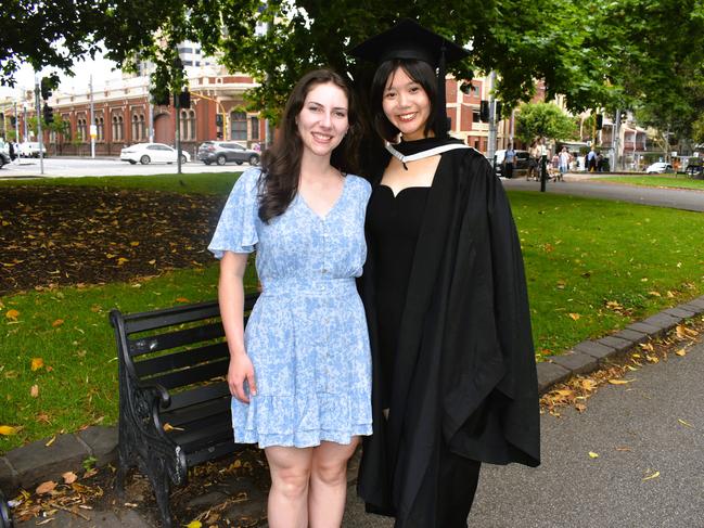 Ella Cassidy and Xin-Pei Hsieh (Bachelor of Oral Health) at the University of Melbourne graduations held at the Royal Exhibition Building on Saturday, December 7, 2024. Picture: Jack Colantuono