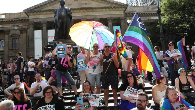 Crowds gathered in front of the State Library of Victoria to hear the outcome of the same-sex marriage vote. Picture: AAP