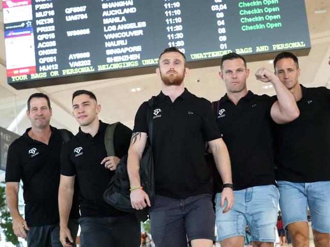 ``Hogan's heroes’’ are on the march. World boxing title challenger Dennis Hogan flanked by some of his Brisbane team: Mark Riockley, Zach Bacigalupo, Chris Muckert, and Murray Thornton. Picture: Liam Kidston.