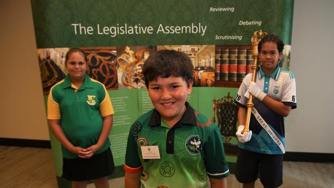 Junior Indigenous Youth Parliament's leader of the Opposition Tyriahna Starkey, (12) Premier Shaun McGinness (10) and Sergeant-at-Arms Raiyah Saveks (11). Picture: PETER CARRUTHERS