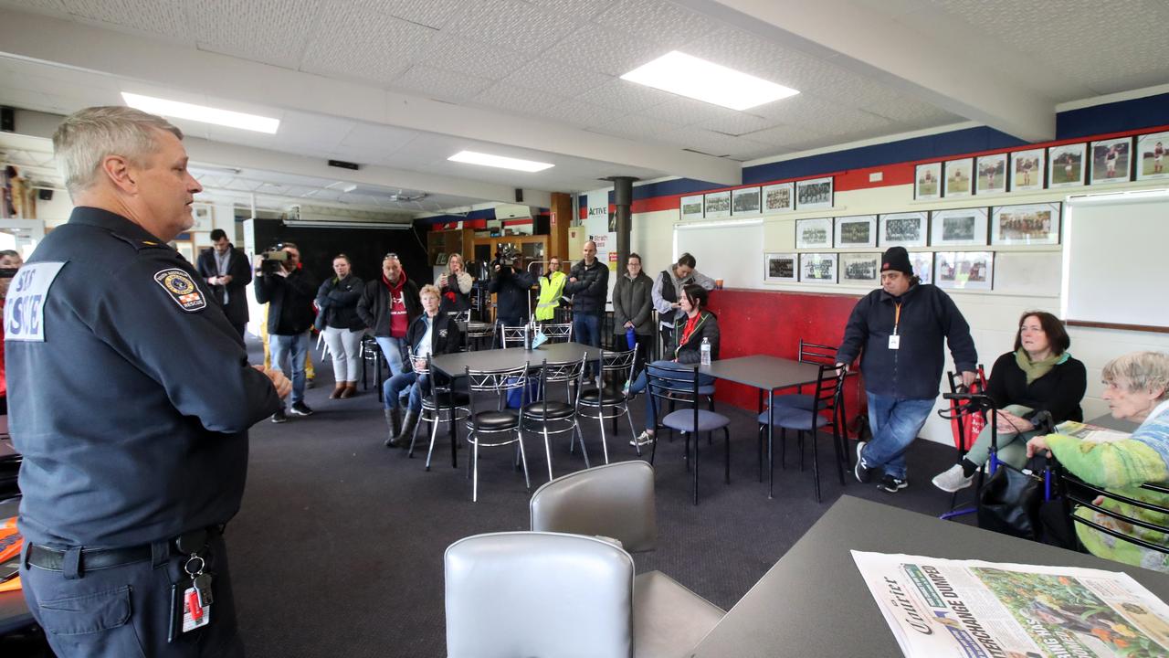 SES Incident Controller Craig Brassington speaks to the residents at the Echunga Football Club, as their homes are in direct line of the possible flooding from the dam at Echunga. Picture: Kelly Barnes