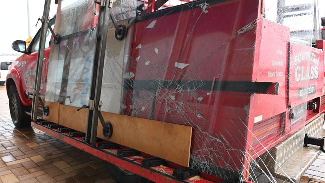 The Flava Cafe’s smashed window on a repair truck. Picture: Keryn Stevens