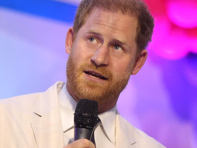 Britain's Prince Harry, Duke of Sussex, gives a speech as he attends a Sit Out with Britain's Meghan (unseen), Duchess of Sussex, at the Nigerian Defence Headquarters in Abuja on May 11, 2024 as they visit Nigeria as part of celebrations of Invictus Games anniversary. (Photo by Kola SULAIMON / AFP)