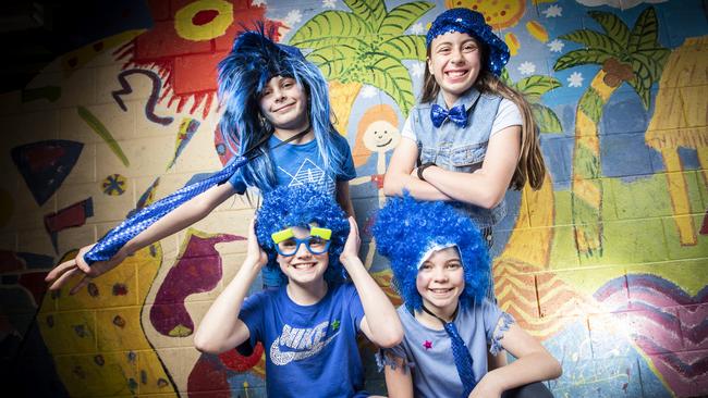 Lauderdale Primary School students dressed in blue for 'Homely Retreats Day' (L-R standing) Siblings Giovanni, 10 and Miracle, 11 Bocchino and (L-R front) Prinze Taylor and Isobel Vollus both 11. Picture: LUKE BOWDEN