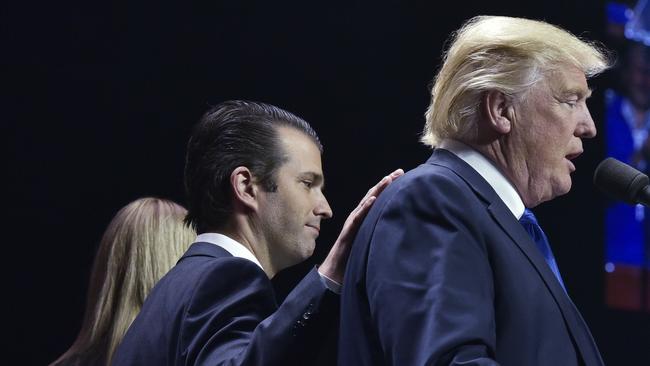 Donald Trump Jr. and his father at a Manchester, N.H., rally on the last night of the 2016 presidential campaign.. Picture: AFP Photo/Mandel Ngan