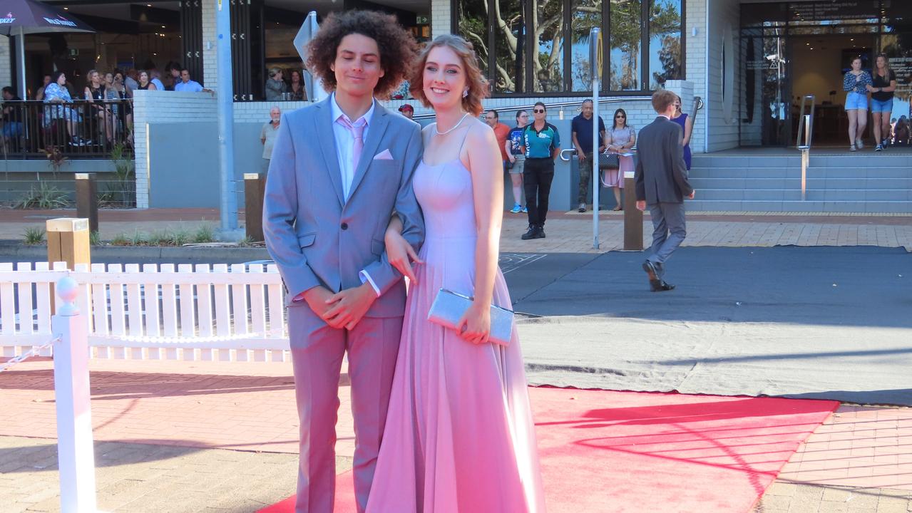 The students from Urangan State High School celebrating their formal.