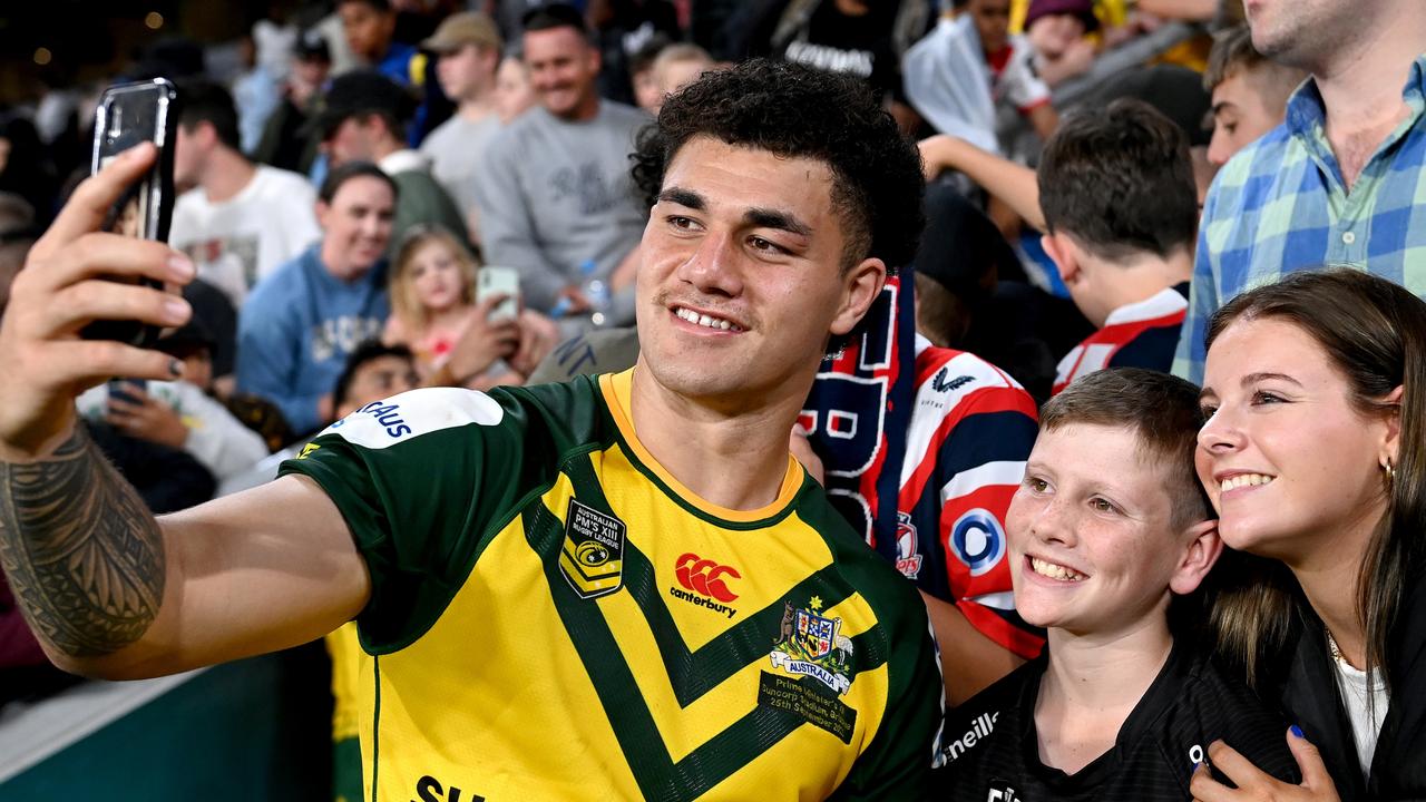 Jojo Fifita has a selfie with fans after representing the Prime Minister’s XIII against Papua New Guinea last month. Picture: Bradley Kanaris/Getty Images