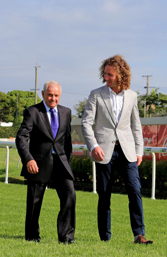 Leading trainers in their respective states, Kelso Wood and Ciaron Maher walk on the course proper. Picture: AAP