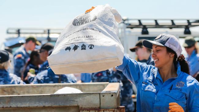 Larrakia Ranger Jessica Puntoriero with part of the load of Rubbish cleaned up from Darwin Harbour and Gunn Point. PIC GLENN CAMPBELL