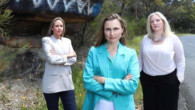 Jacqui Scruby (independent candidate for Pittwater), Joeline Hackman (independent candidate for Manly) and Sarah Baker (environmental campaigner in Wakehurst) at Lizard Rock in Belrose. Picture: John Feder/The Australian.