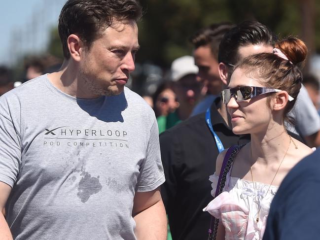 Musk with Grimes at the 2018 Space X Hyperloop Pod Competition, in Hawthorne, California on July 22, 2018. Picture: AFP/Robyn Beck