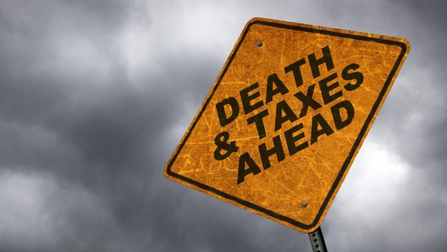 A road sign warning of the inevitability of death & taxes. inheritance tax generic