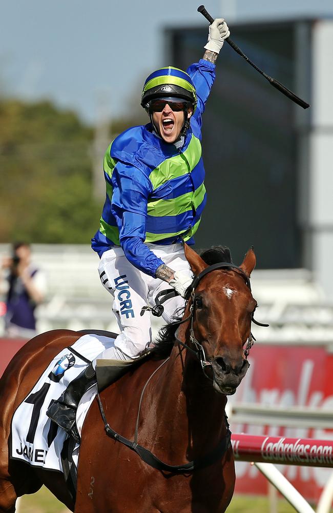 Jockey Nicholas Hall jumps out of his saddle as Jameka strolls to victory in the Caulfield Cup. Picture: Colleen Petch