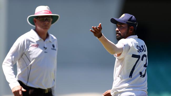 Mohammed Siraj of India stops play to make a formal complaint about some spectators in the bay behind his fielding position during day four of the Third Test against Australia at the SCG. Picture: Getty Images