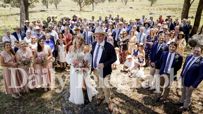 The couple pictured with their wedding guests after the ceremony. Picture: Salty Dingo