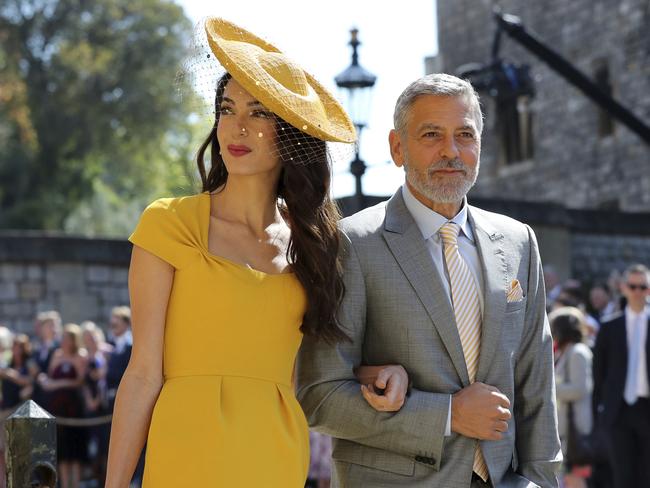 Amal and George Clooney are close friends with Prince Harry. Picture: AP