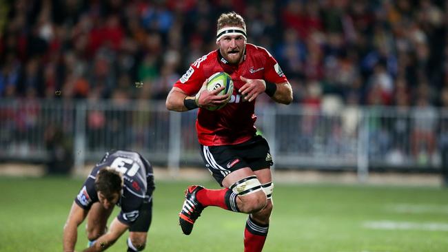 Kieran Read of the Crusaders breaks away to score a try.