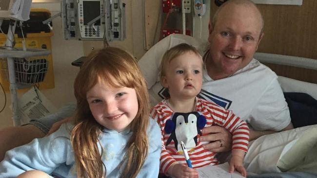 Jarrod Lyle with his two young daughters.