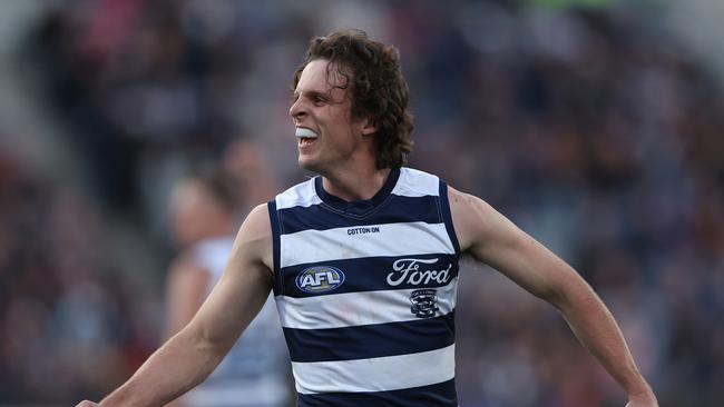 GEELONG, AUSTRALIA - MAY 06: Max Holmes of the Cats celebrates after scoring a goal during the round eight AFL match between Geelong Cats and Adelaide Crows at GMHBA Stadium, on May 06, 2023, in Geelong, Australia. (Photo by Robert Cianflone/Getty Images)