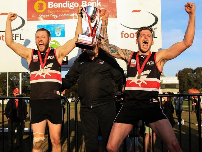 Park Orchards captain Tom Feher and coach Jarrod Bayliss lift the 2017 Division 3 premiership cup. Picture: Davis Harrigan