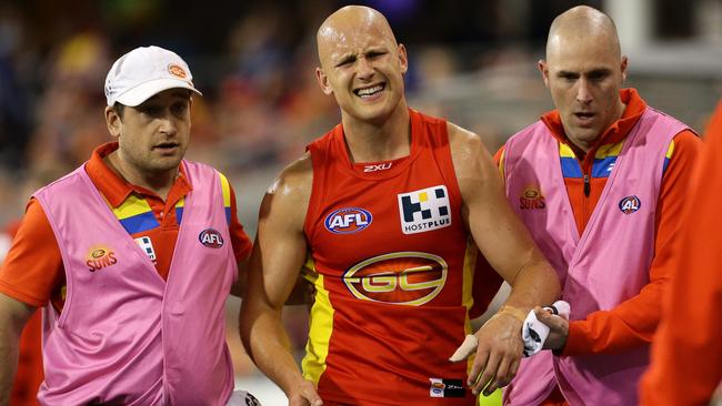 Gary Ablett comes off injured in the 3rd quarter during the round 16 AFL game between the Gold Coast Suns and Collingwood from Metricon Stadium, Carrara. Pics Adam Head