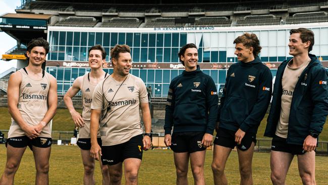 Mitchell with the Hawks’ draftees.