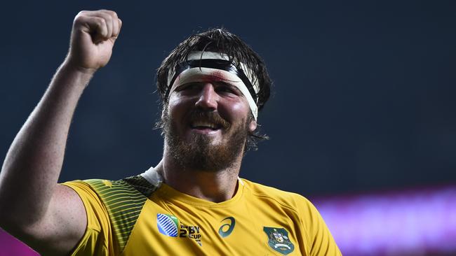 Australia lock Kane Douglas celebrates beating England at the 2015 Rugby World Cup.