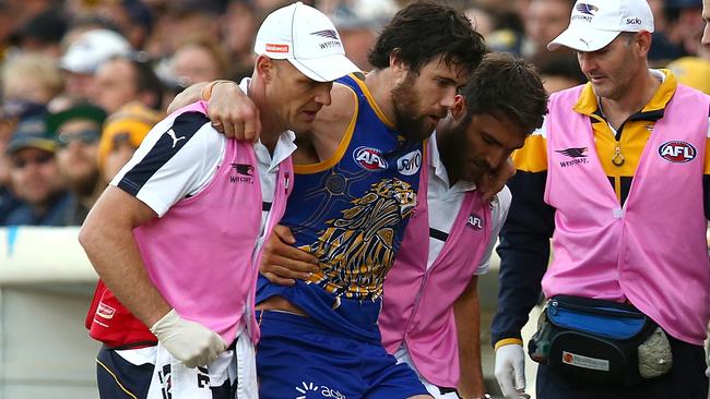 Josh Kennedy is helped off Subiaco.