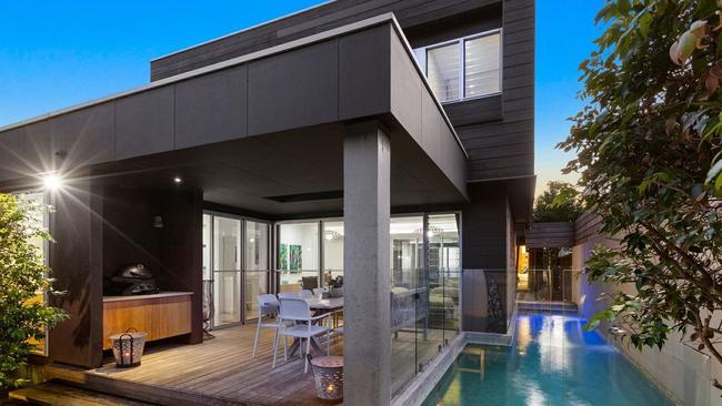Time by the pool would be super comfortable at this Bozier Court, Casuarina home.