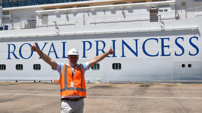 Tourism and Hospitality Minister Joel Bowden in front of the Royal Princess cruise ship.