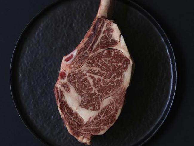 Beautifully marbled rib eye ready for the wood fired grill at Rockpool Bar &amp; Grill. Picture: Rockpool Group/Instagram