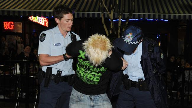  A typical night in Fortitude Valley for Brisbane police, who battle to contain the drunken violence on the streets.