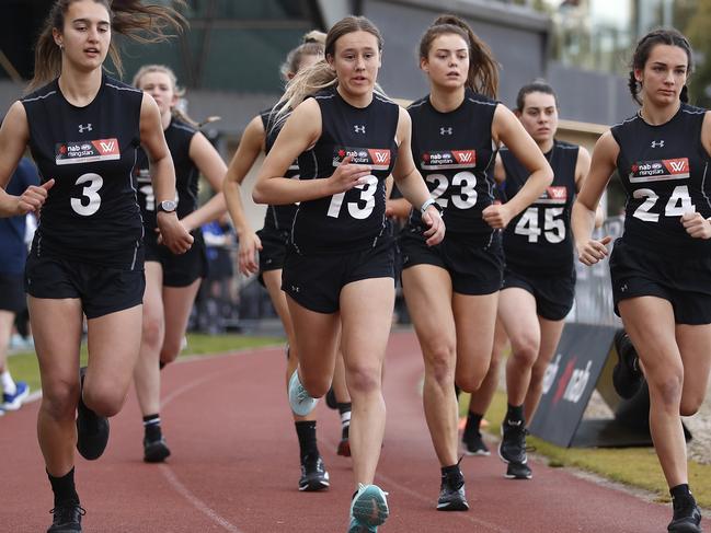 Hannah Munyard (13) completes the 2km time trial during the 2019 AFLW Draft Combine at the Holden Centre on October 1, 2019 in Melbourne. Picture: DYLAN BURNS/AFL PHOTOS VIA GETTY IMAGES