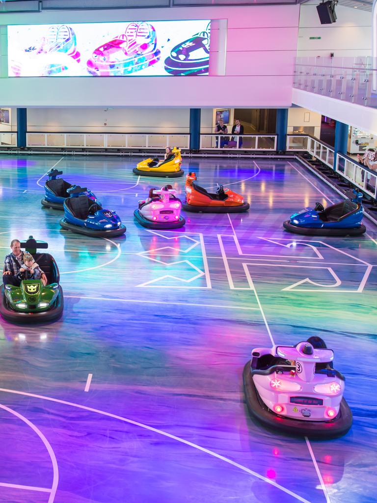 The largest sports complex at sea has bumper cars.