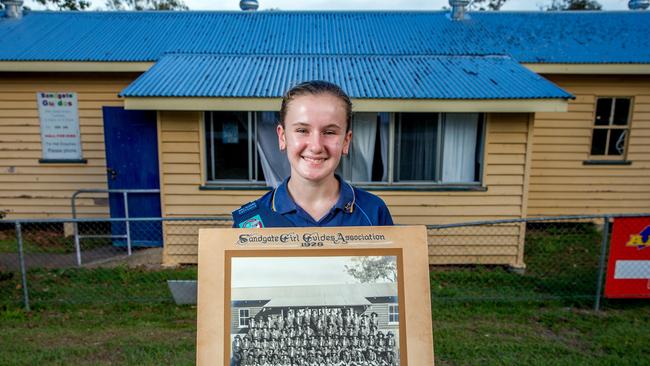 Current Girl Guide Shikirra Earle outside the 90 year old Sandgate Guide Hut. PICTURE: AAP/Richard Walker.