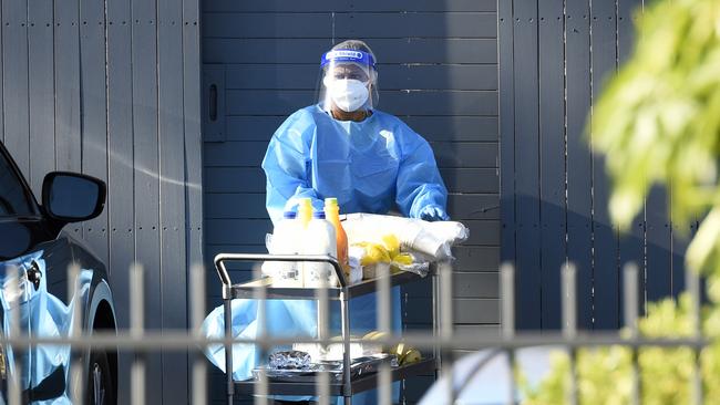 MELBOURNE, AUSTRALIA - NewsWire Photos FEBRUARY 7, 2022: Staff wearing full PPE at Twin Parks Aged Care facility at Reservoir which has had a Covid outbreak. Picture: NCA NewsWire / Andrew Henshaw