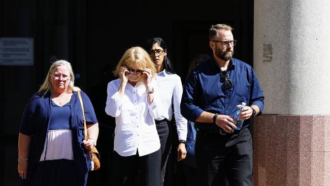 Family members of pilot Stuart Weavell leave the Cairns Coroner's Court during the inquest into a plane crash on Cape York, which killed Mr Weavell and four QBuild contractors on March 11, 2020. The light plane crashed into sand dunes in bad weather during the approach to Lockhart River airport, killing all five men onboard. Picture: Brendan Radke