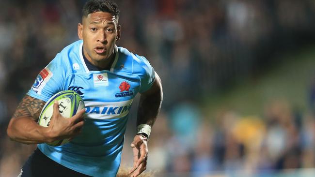 Israel Folau in action for the Waratahs against the Blues on Saturday night.