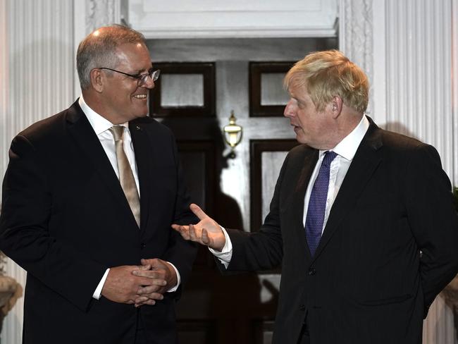 Prime Minister Scott Morrison greets UK Prime Minister Boris Johnson to a working dinner in Washington. Picture: Adam Taylor