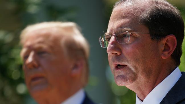 Alex Azar at the White House with Donald Trump. Picture: AFP