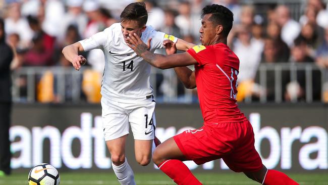 Defensive midfielder Renato Tapia (in red) is one player the Socceroos need to be wary of at the World Cup. Picture: Getty Images
