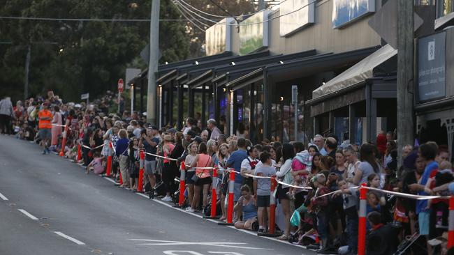 People wait for the start of the parade during the annual Halloween Street Party held in Manly in 2018. Picture: Regi Varghese