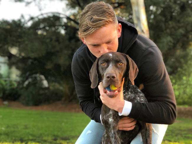 Jack Ziebell with his dog Flash.