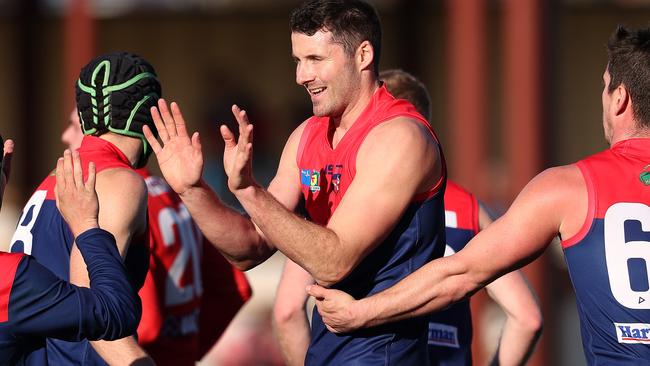 North Hobart V Clarence. Colin Garland celebrates a goal with his North Hobart teammates. Picture: NIKKI DAVIS-JONES