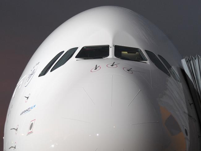 (FILES) In this file photo taken on October 30, 2009 then new Airbus A380 superjumbo passenger jet sits on the tarmac of the Airbus plant in Hamburg as the French flag carrier Air France became the first European airline to take delivery of the plane in a ceremony in the northern German city before flying to Paris's Charles de Gaulle airport. - European aerospace giant Airbus said on February 14, 2019 it would end production of the A380 superjumbo, the double-decker jet which earned plaudits from passengers but failed to win over enough airlines to justify its massive costs. The firm said it would stop deliveries in 2021 of the A380, which has been in operation for more than a decade, after Dubai-based carrier Emirates reduced its total order of the model by 39 planes. (Photo by Eric PIERMONT / AFP)