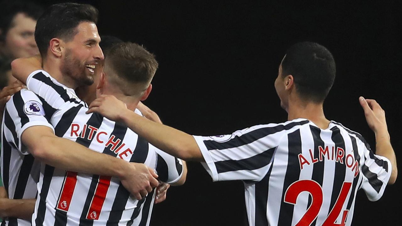 Newcastle United's Fabian Schar, left, celebrates. (Owen Humphreys/PA via AP)