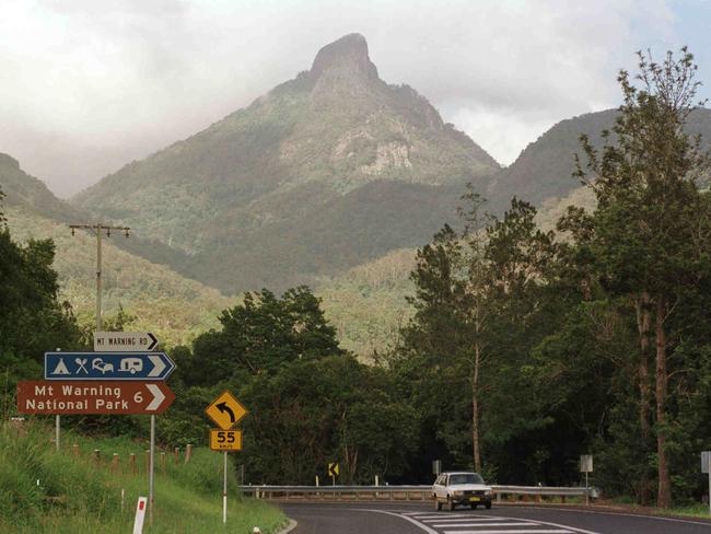 Jan 08 1999 -  Mt. Warning . in demand for viewing /sunrise on 1/1/00.  PicGeoff/McLachlan - travel scenic mountains mount street scene signs NSW  .       .                     .             ..  .  .